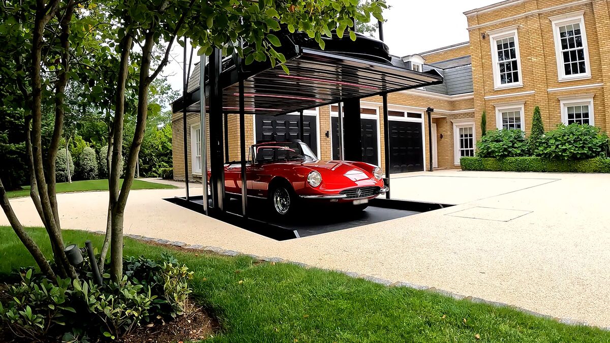 A car is parked on the parking system.