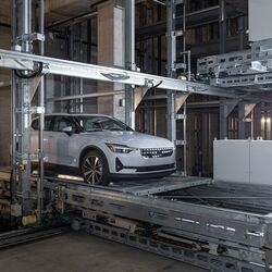 The car is automatically moved to its parking space within the parking system.